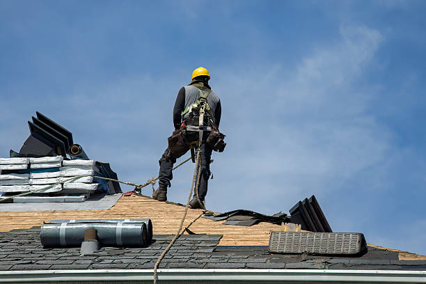 Professional Roofing technician working in Newton, MA